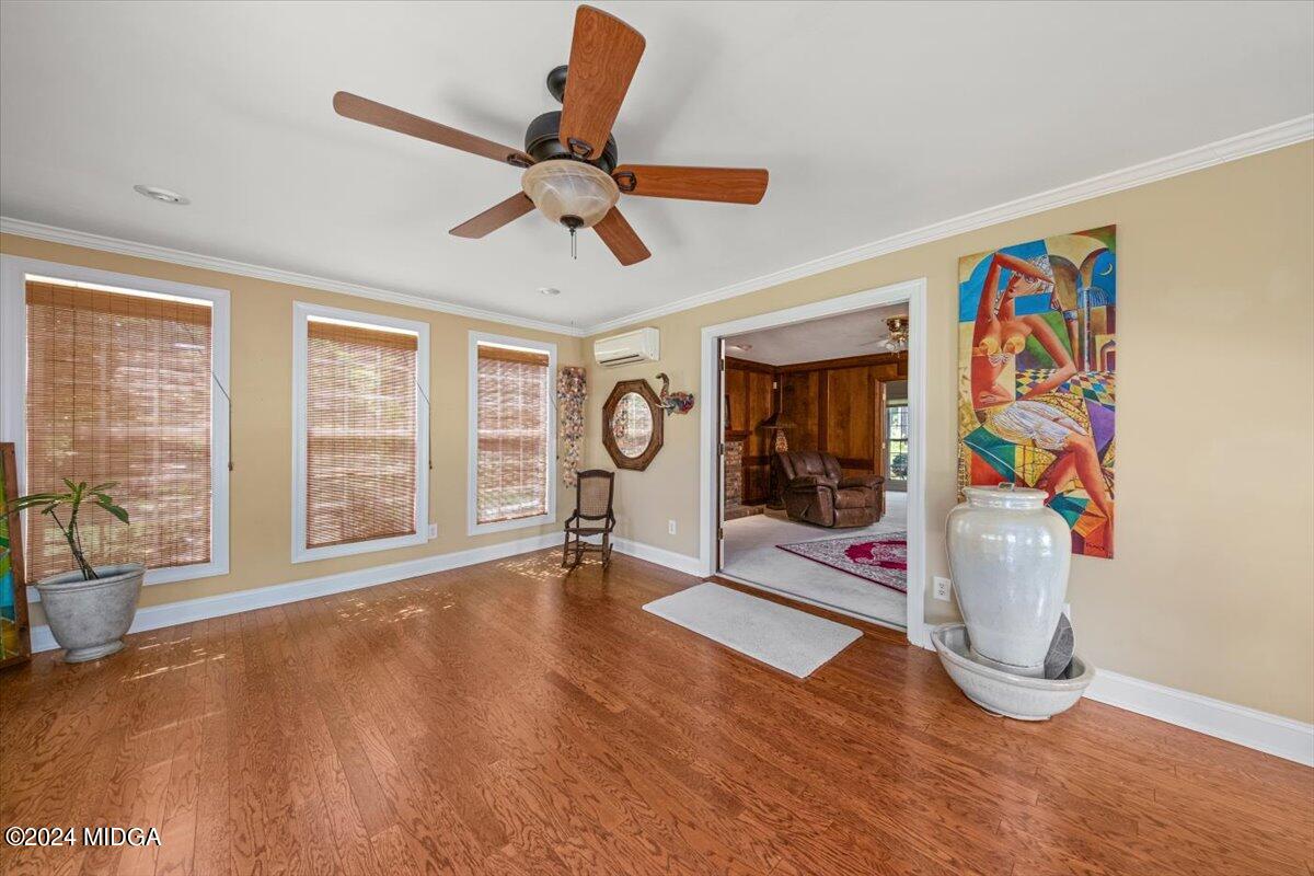 5369 Rivoli Drive Macon, GA 31210 - Photo 20 of 40 a view of an empty room with window ceiling fan and refrigerator