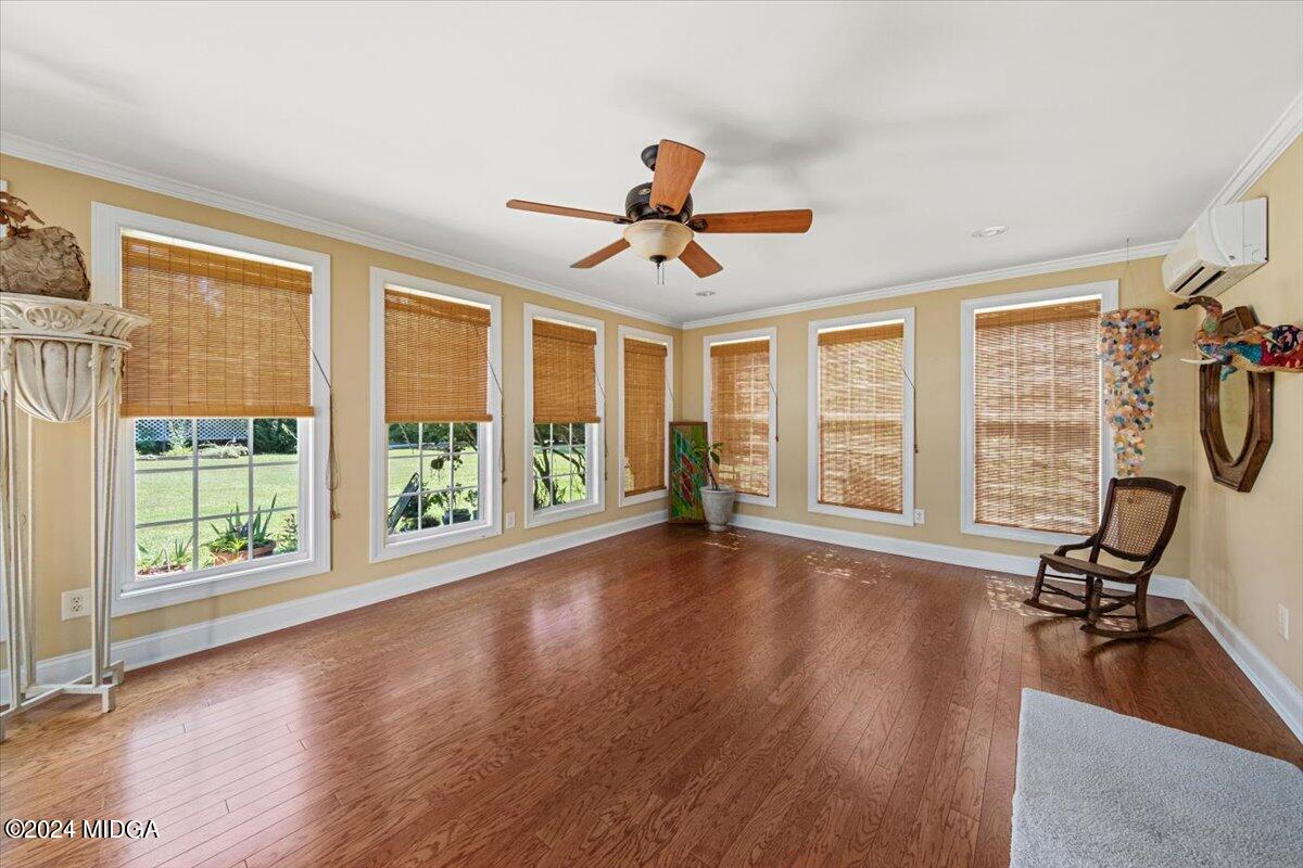 5369 Rivoli Drive Macon, GA 31210 - Photo 21 of 40 a view of a livingroom with wooden floor and furniture
