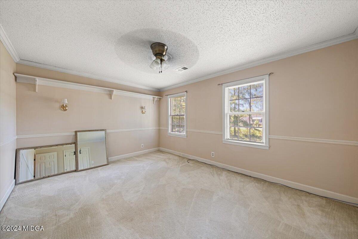 5369 Rivoli Drive Macon, GA 31210 - Photo 35 of 40 a view of an empty room with a window