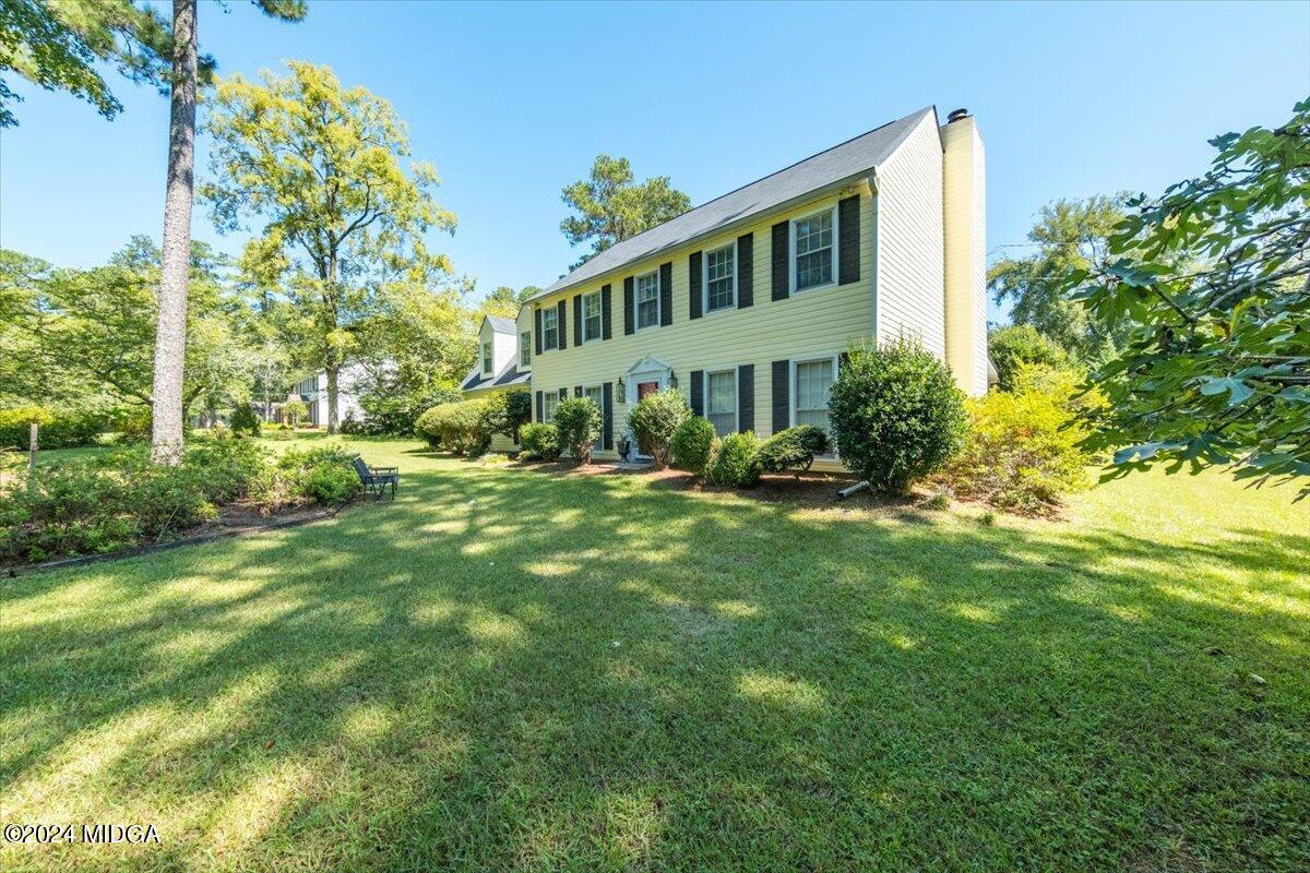 5369 Rivoli Drive Macon, GA 31210 - Photo 6 of 40 a view of a house with a yard