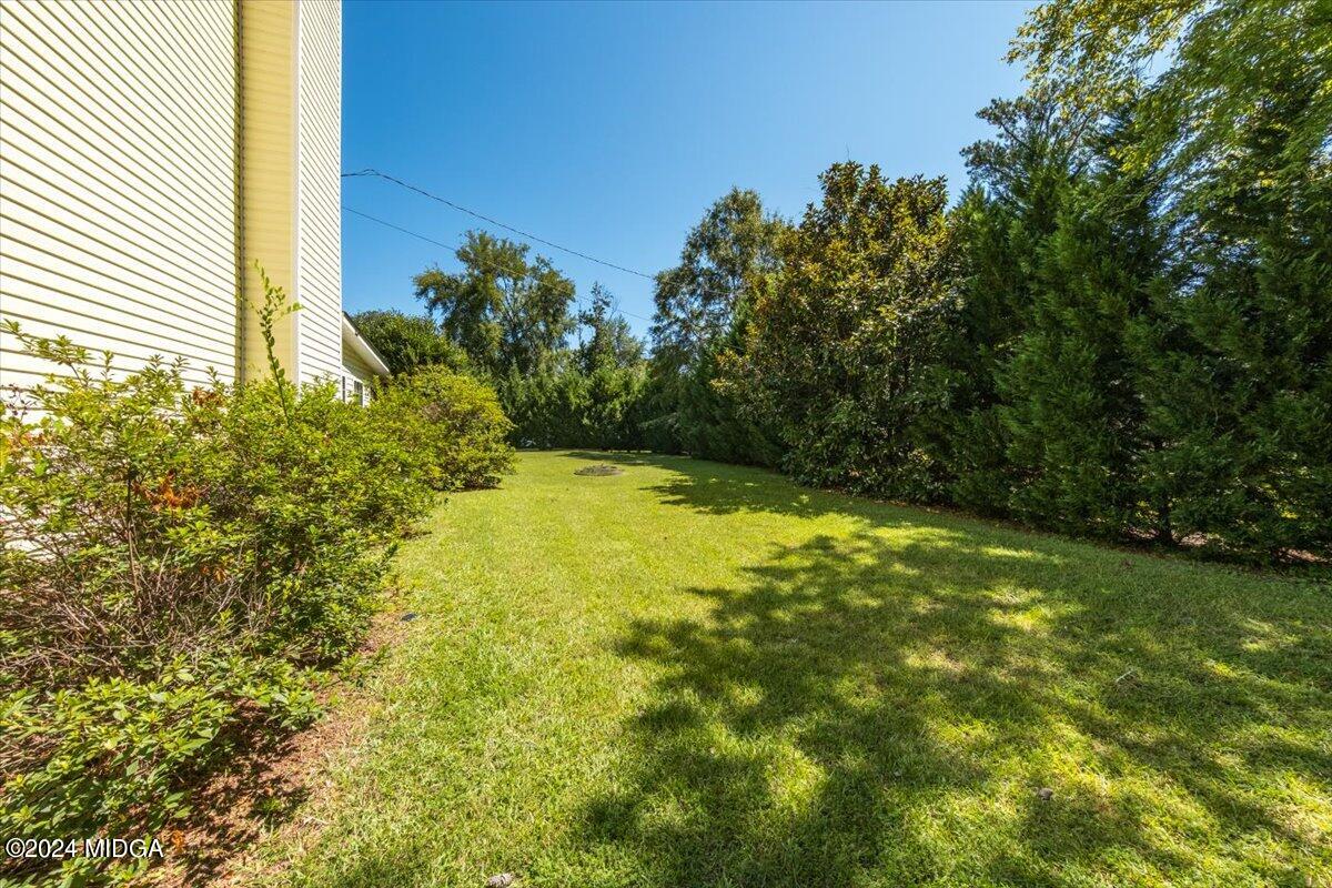 5369 Rivoli Drive Macon, GA 31210 - Photo 7 of 40 a view of yard with swimming pool