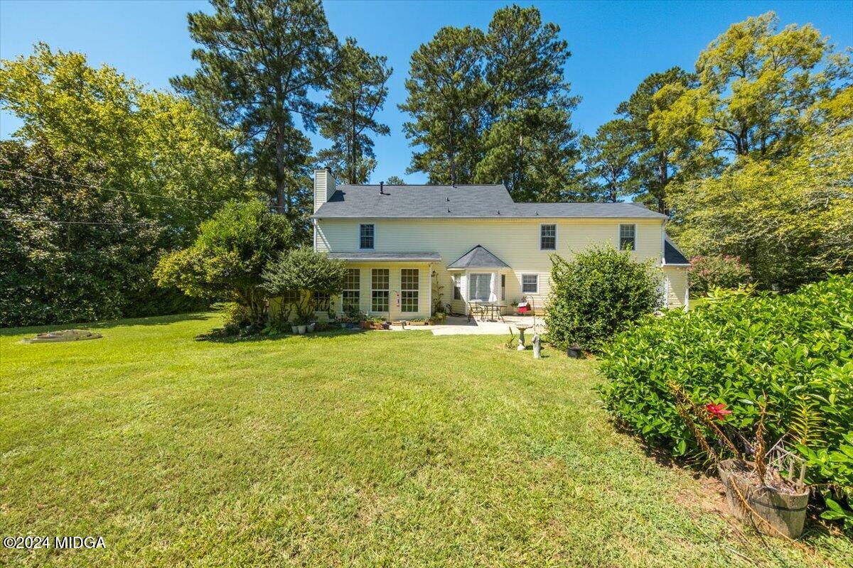 5369 Rivoli Drive Macon, GA 31210 - Photo 10 of 40 a front view of a house with yard and green space