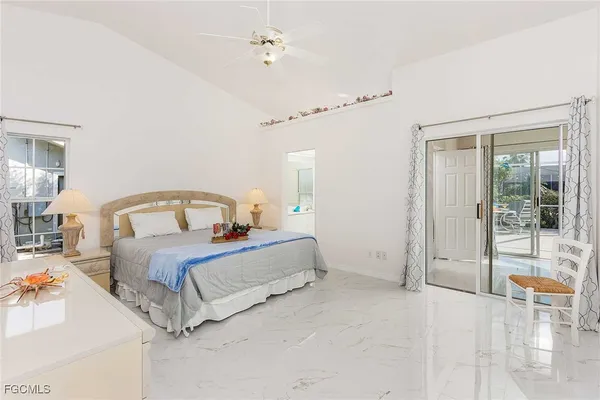 a bathroom with a bathtub sink and mirror