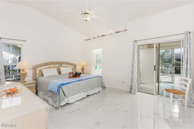 a bathroom with a bathtub sink and mirror
