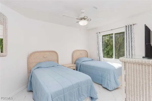 a view of outdoor dining space with a table and chairs