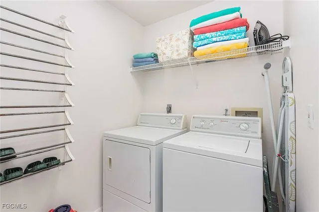 a view of a garden with lawn chairs