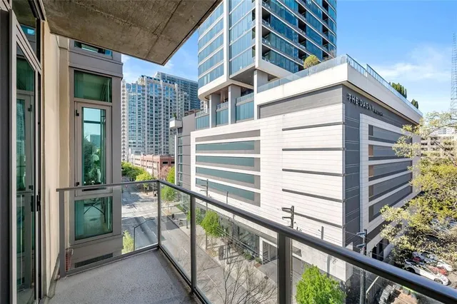 a view of a balcony with chair