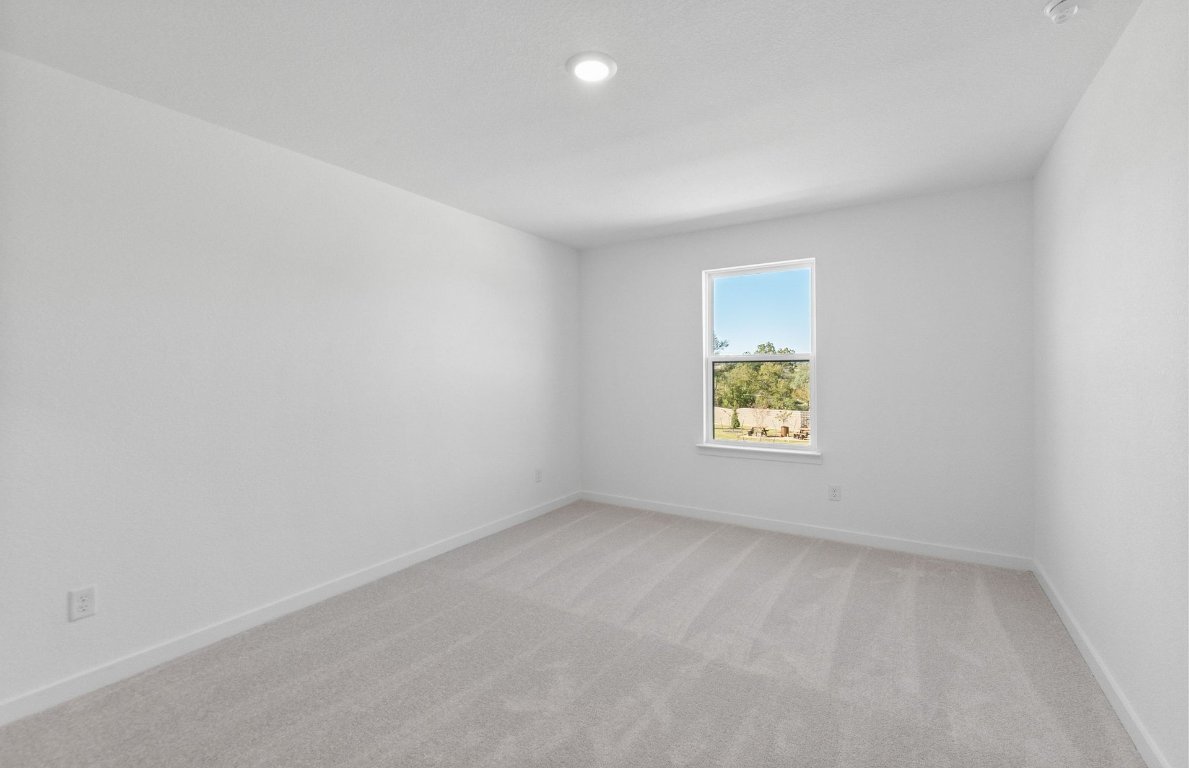 1280 East Main Street, Unit 602 Round Rock, TX 78664 - Photo 16 of 22 an empty room with a window