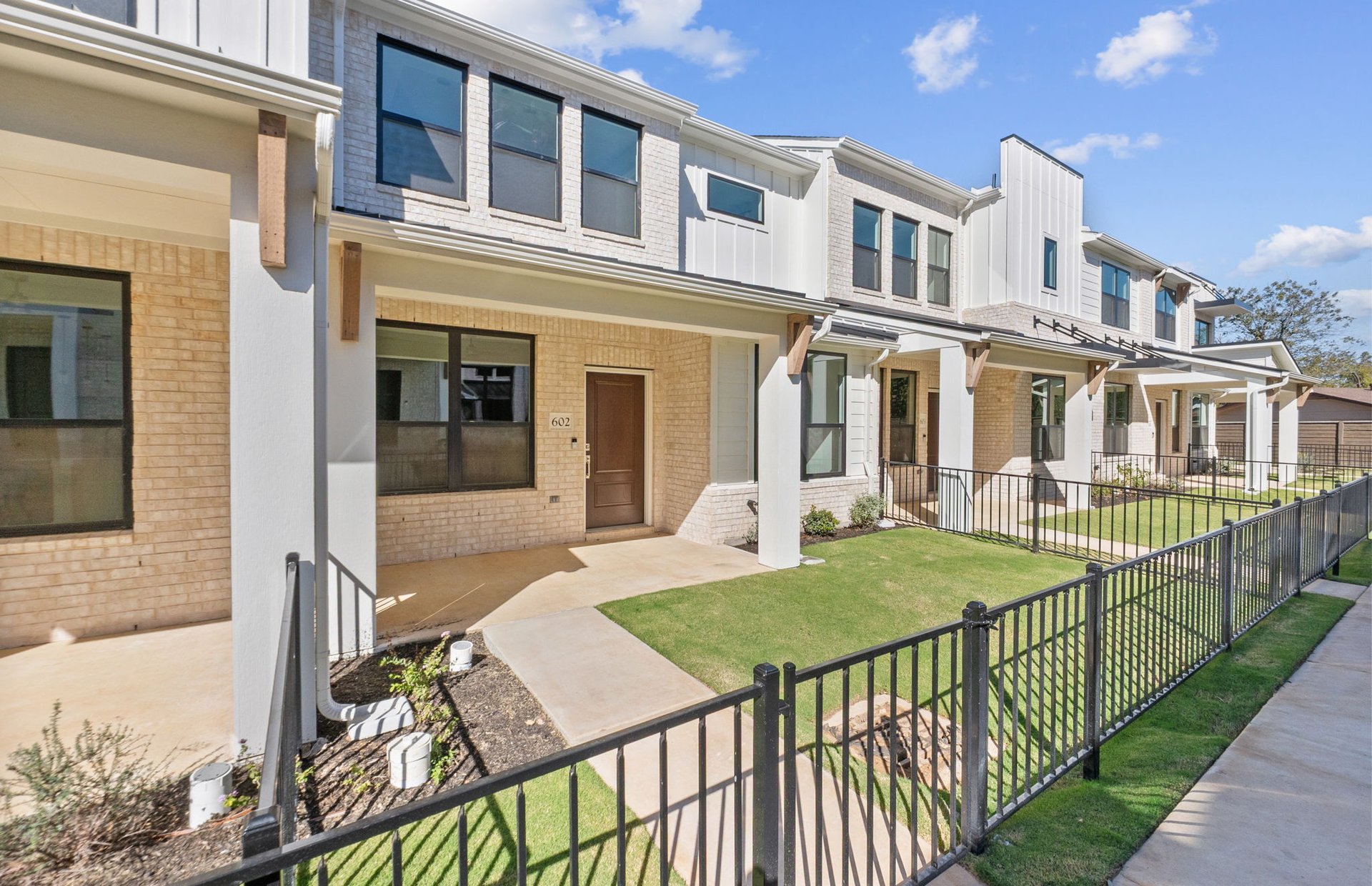 1280 East Main Street, Unit 602 Round Rock, TX 78664 - Photo 3 of 22 a view of a house with backyard and porch