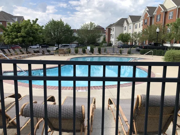 a view of a chairs and tables in the patio