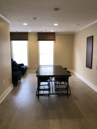 a workspace with furniture and window