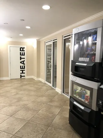 a view of an empty room with a fireplace