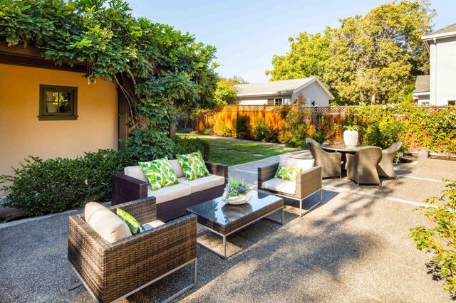a bathroom with a toilet a sink and shower