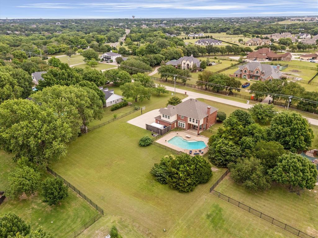 506 Meadowview Road Heath, TX 75032 - Photo 30 of 32 an aerial view of residential houses with outdoor space
