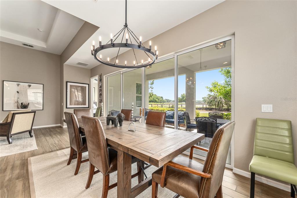 4958 Northwest 35th Ln Road Ocala, FL 34482 - Photo 25 of 66 a view of a dining room with furniture window and outside view