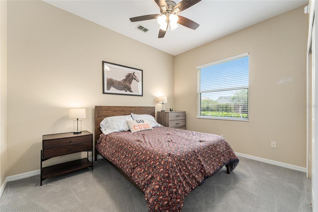 4958 Northwest 35th Ln Road Ocala, FL 34482 - Photo 45 of 66 a bedroom with bed and a window