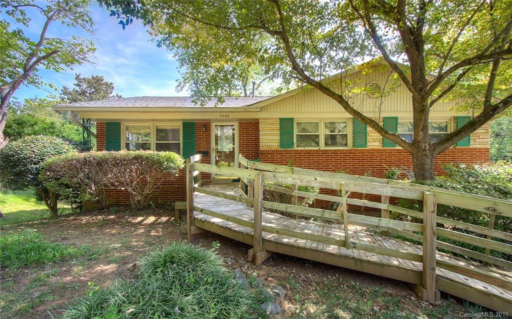 7225 Watercrest Road Charlotte, NC 28210 - Photo 1 of 32 a front view of a house with a yard