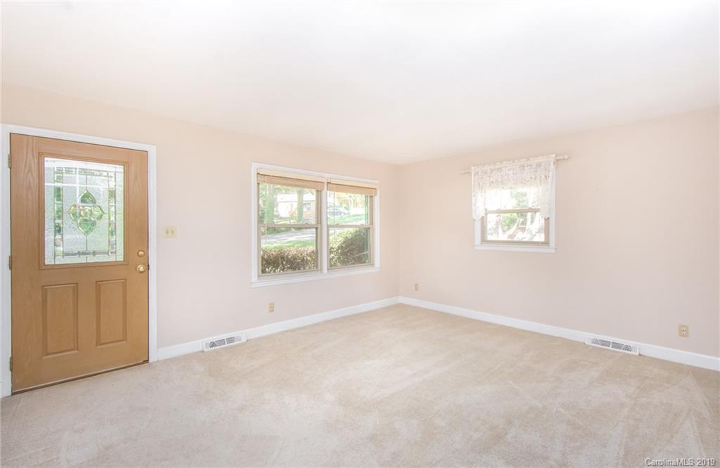 7225 Watercrest Road Charlotte, NC 28210 - Photo 3 of 32 an empty room with windows