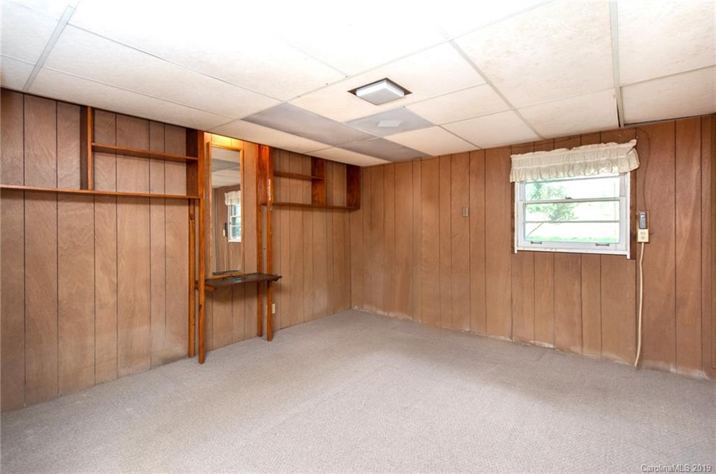 7225 Watercrest Road Charlotte, NC 28210 - Photo 22 of 32 an empty room with windows