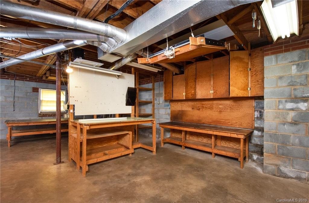 7225 Watercrest Road Charlotte, NC 28210 - Photo 23 of 32 a view of an empty room with windows