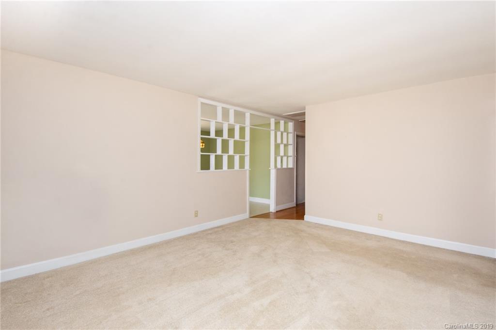 7225 Watercrest Road Charlotte, NC 28210 - Photo 4 of 32 an empty room with windows