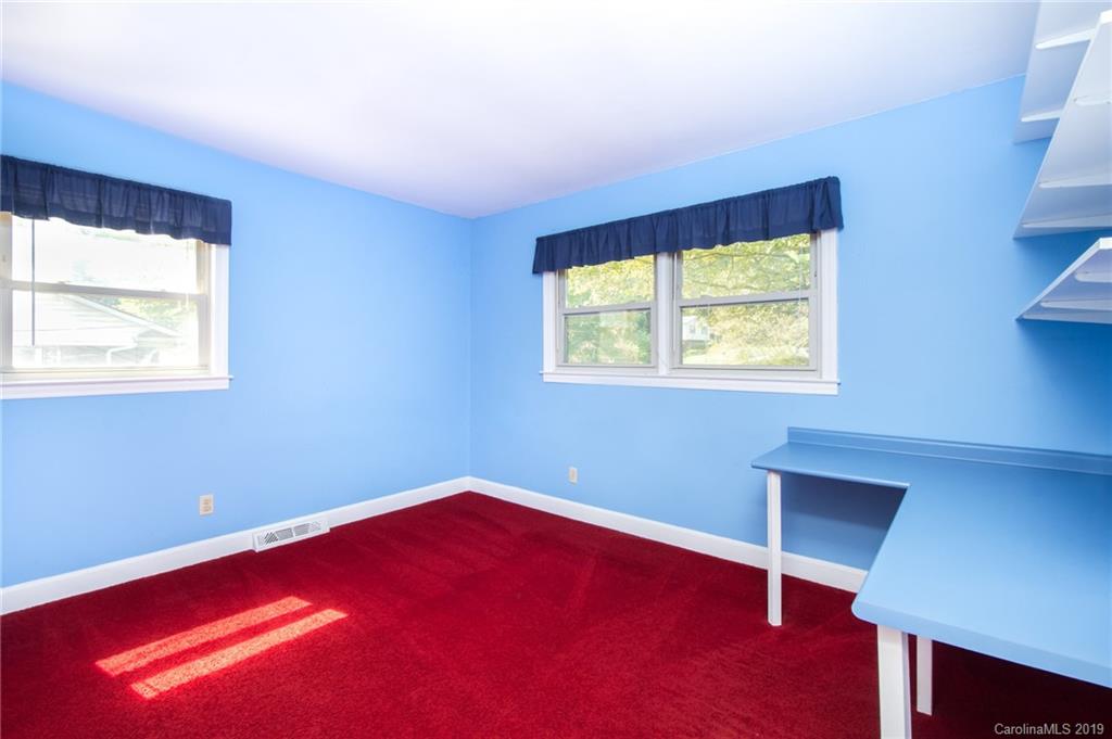 7225 Watercrest Road Charlotte, NC 28210 - Photo 10 of 32 a view of an empty room with a window