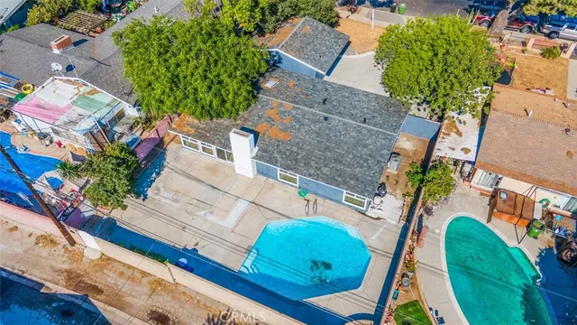 an aerial view of a city and mountain