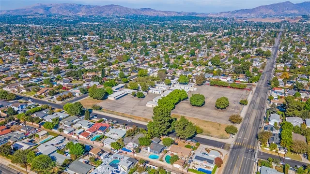 an aerial view of a city with lots of residential buildings