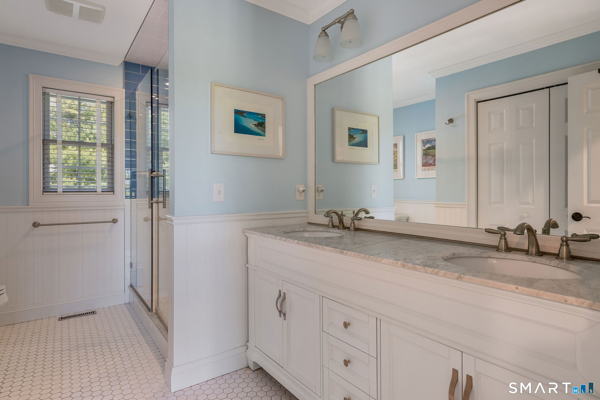 170 Devonshire Lane Madison, CT 06443 - Photo 27 of 39 a bathroom with double sink and a mirror
