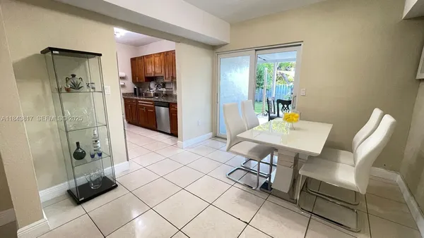 a kitchen with stainless steel appliances granite countertop a stove and a microwave