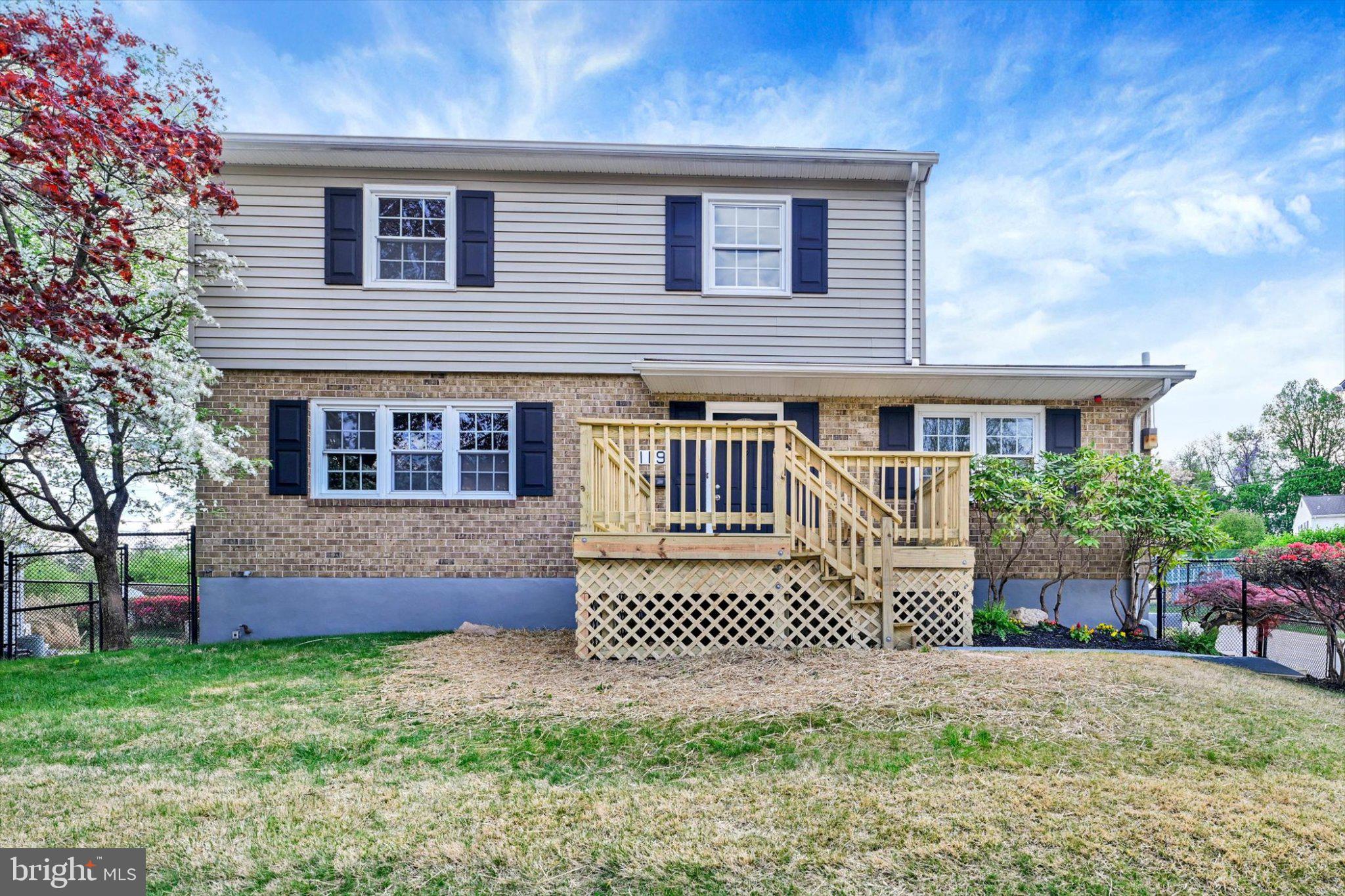 Charming home with inviting deck.