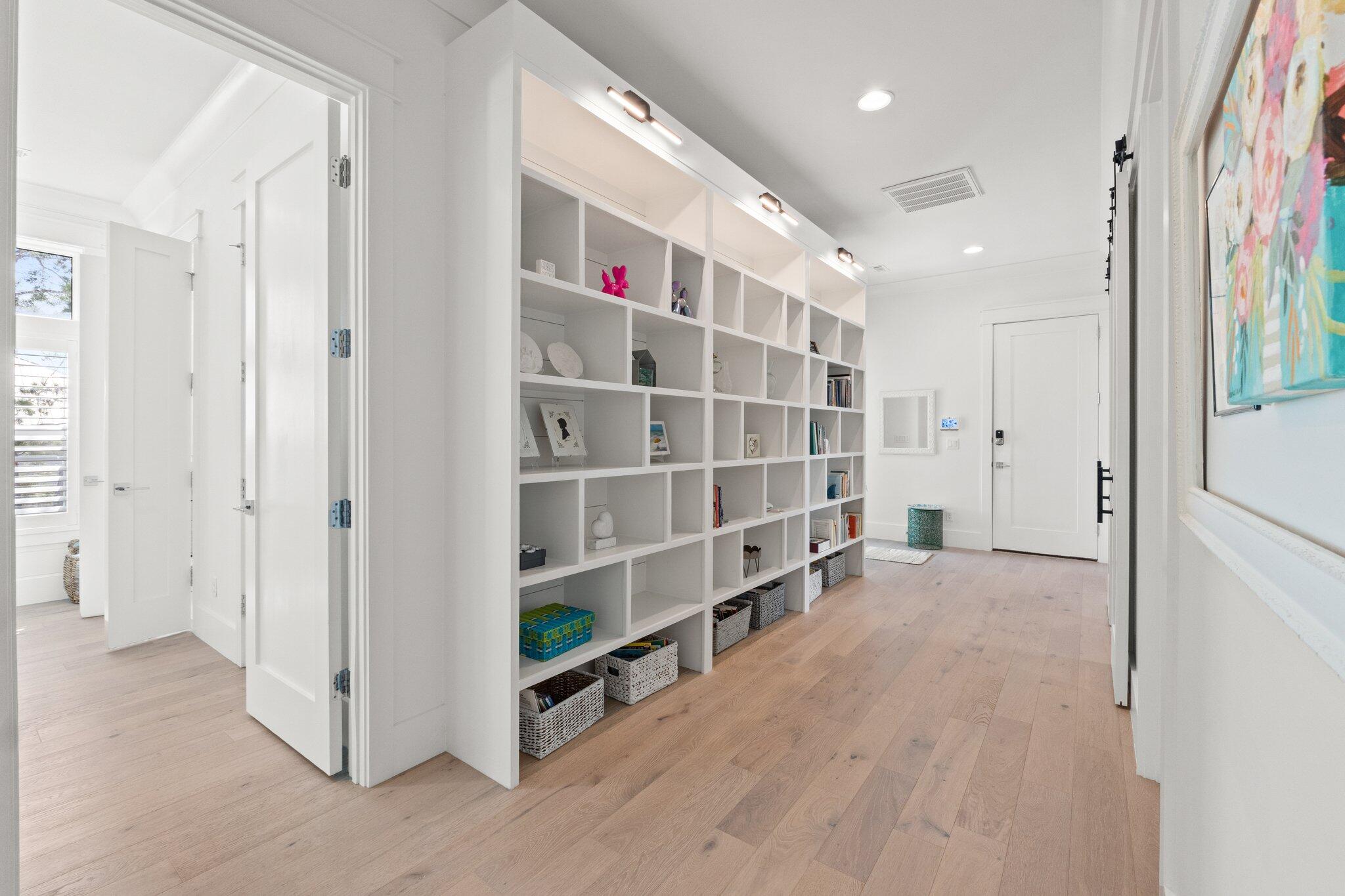 479 Ridge Road Santa Rosa Beach, FL 32459 - Photo 13 of 46 a view of an empty room with wooden floor and a window