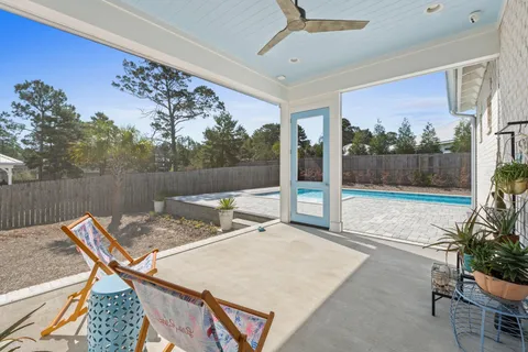 a view of a living room and a patio
