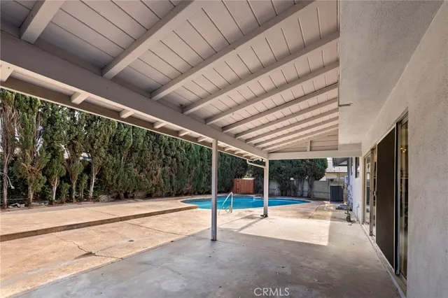 a view of a house with a yard and garage