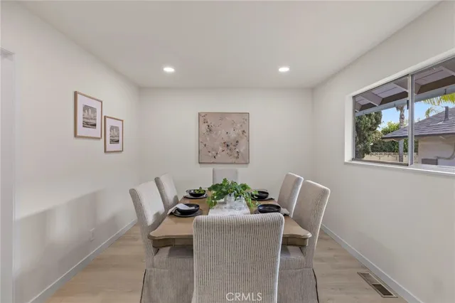 a view of a dining room with furniture