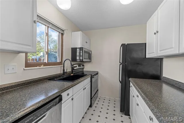 $128,000 | 2801 Savoy Drive, Unit 2801, Lake St. Louis, MO 63367