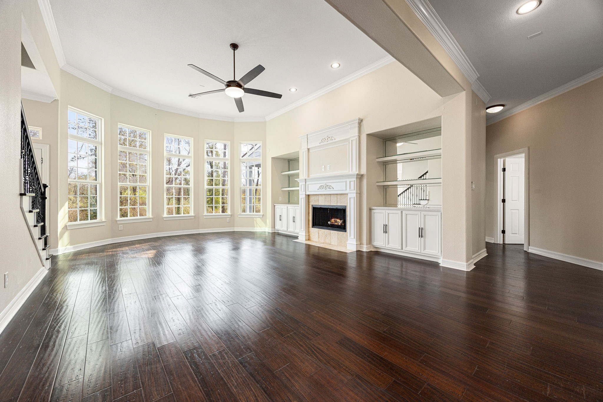 14882 Gingham Road Montgomery, TX 77356 - Photo 15 of 50 a view of an empty room with wooden floor and a window