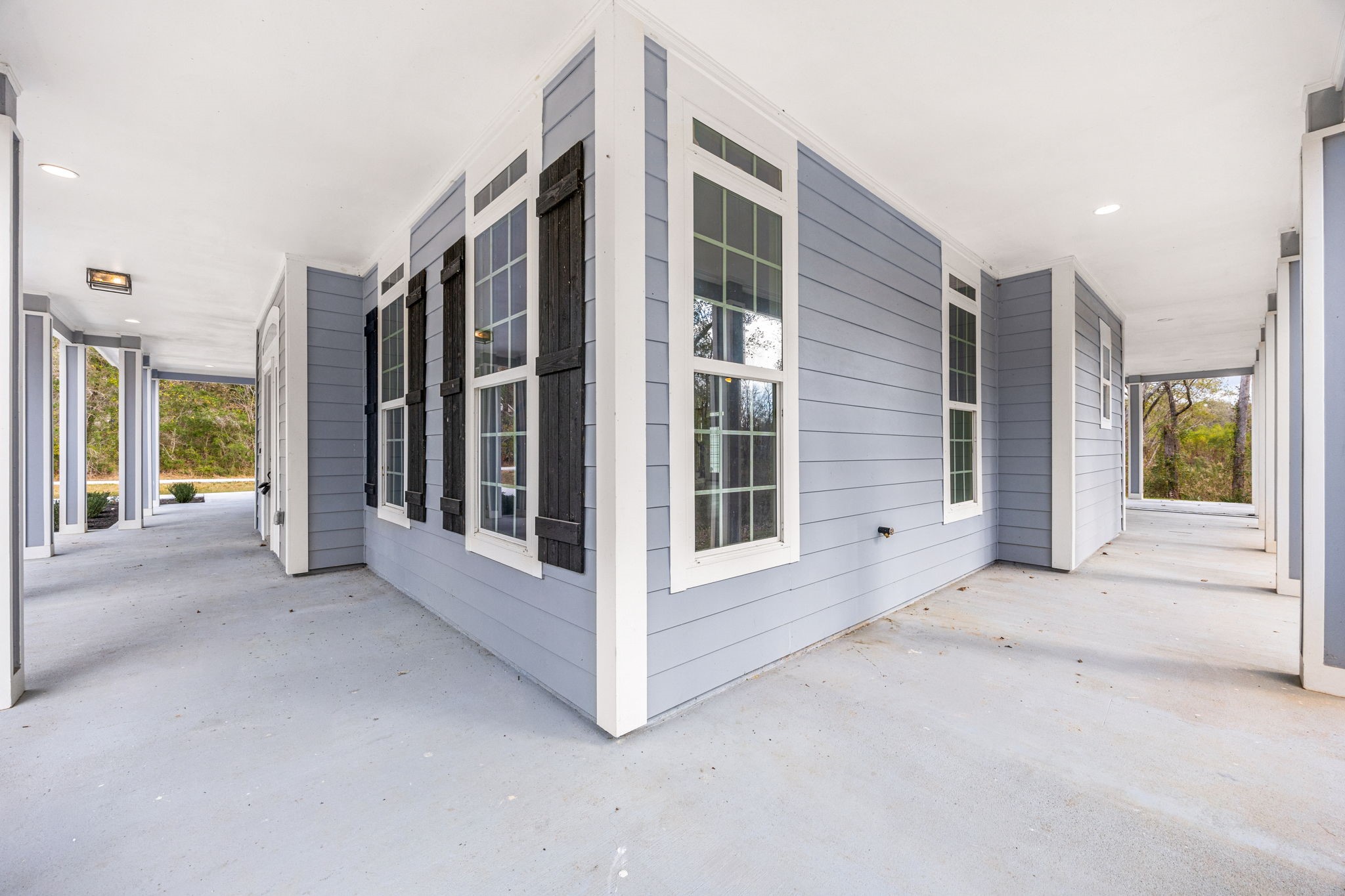 14882 Gingham Road Montgomery, TX 77356 - Photo 5 of 50 a view of a big room with windows