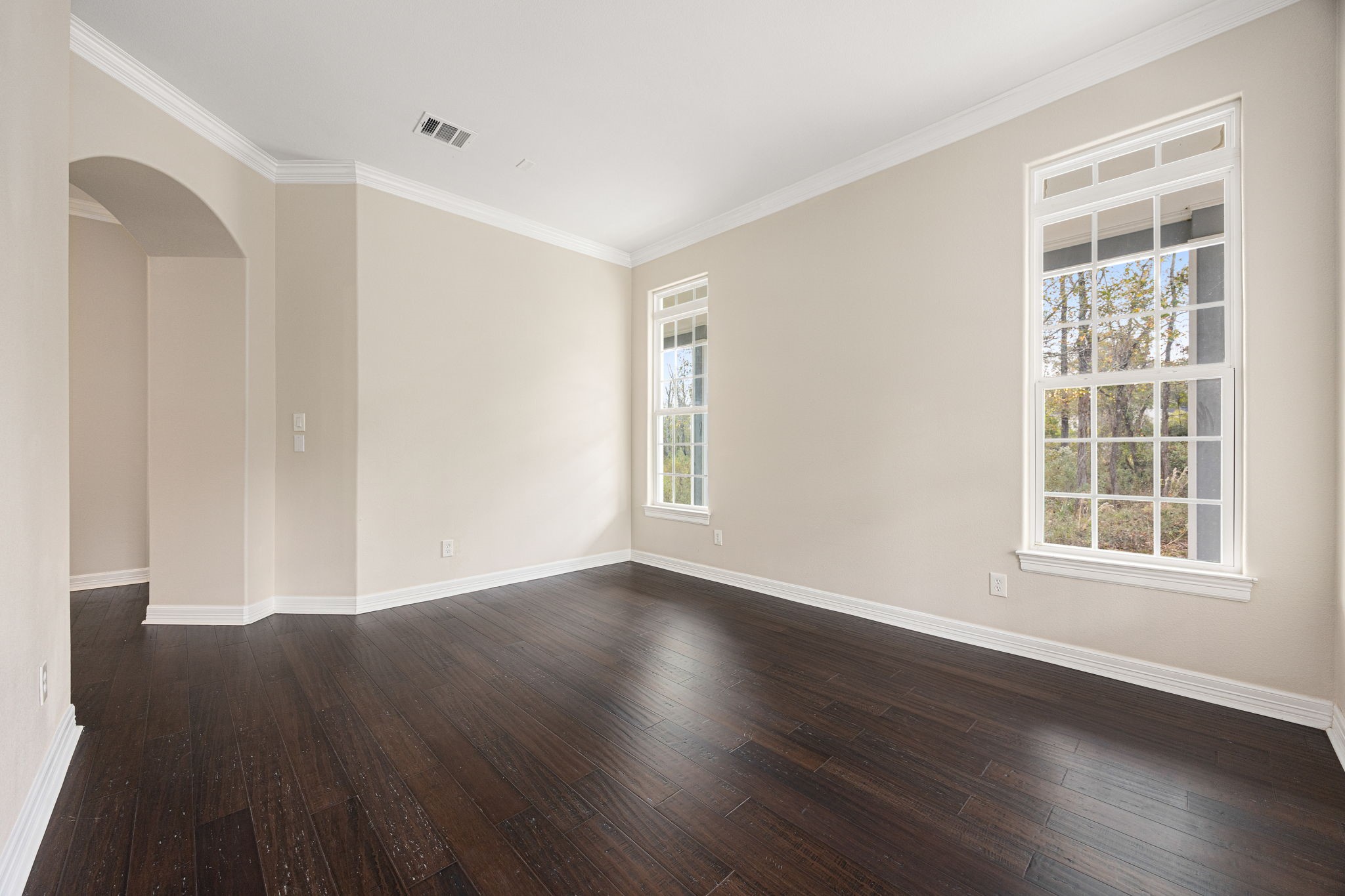 14882 Gingham Road Montgomery, TX 77356 - Photo 8 of 50 an empty room with wooden floor and windows