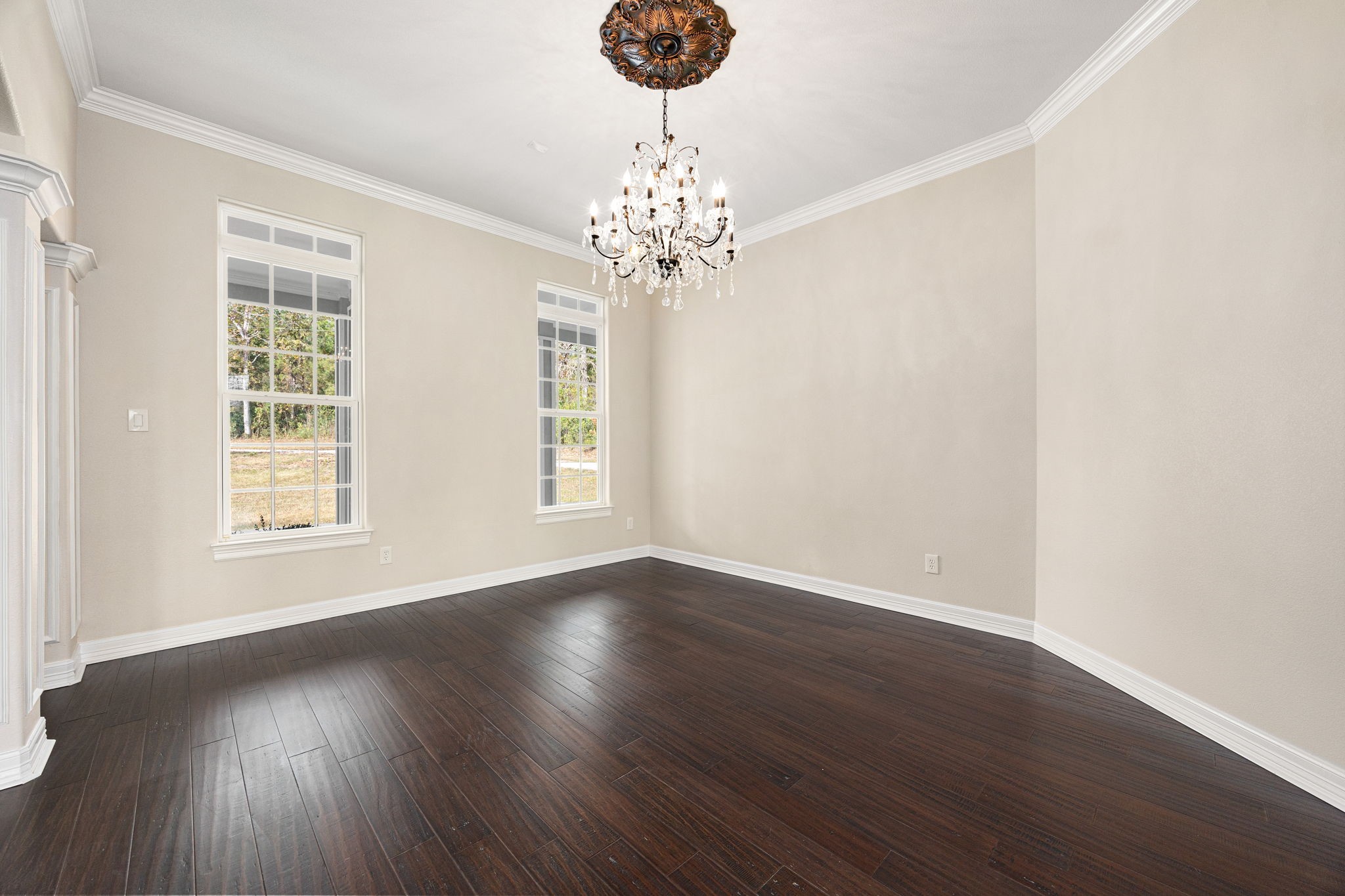 14882 Gingham Road Montgomery, TX 77356 - Photo 9 of 50 a view of an empty room with wooden floor and a window