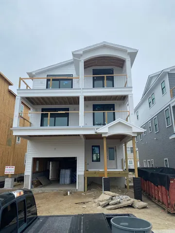 a front view of a building with balcony