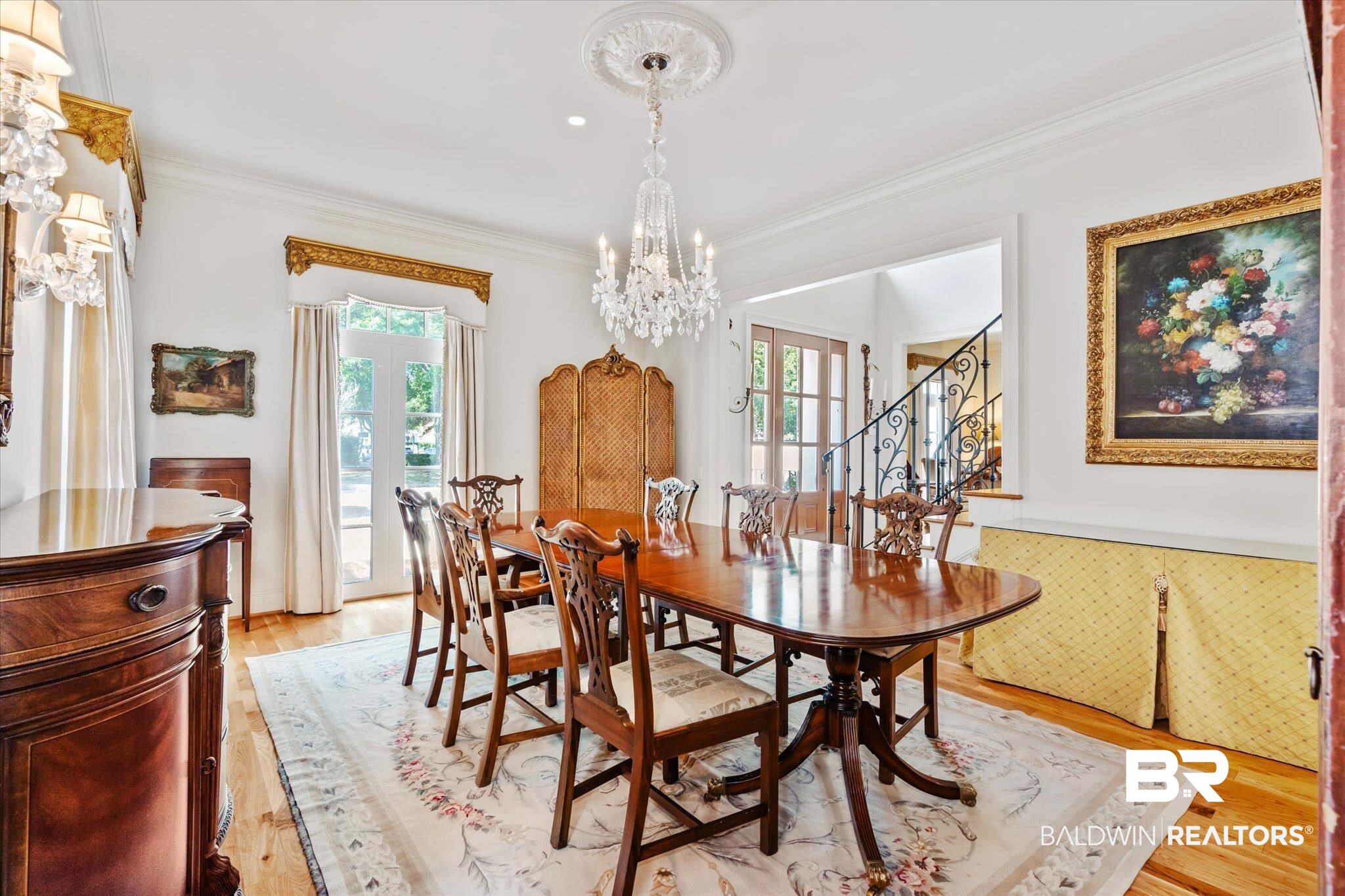 3963 Wimbledon Park Mobile, AL 36608 - Photo 8 of 51 Dining room with light wood-type flooring, crown molding, and an inviting chandelier