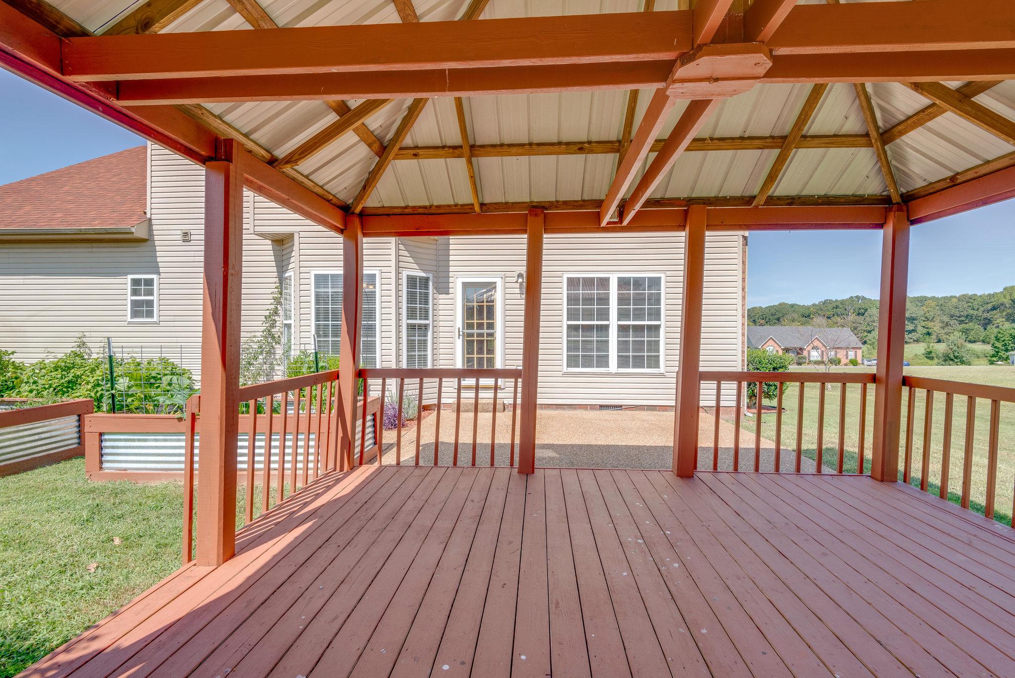 269 Eastside Road Burns, TN 37029 - Photo 5 of 22 a view of outdoor space with wooden floor and deck