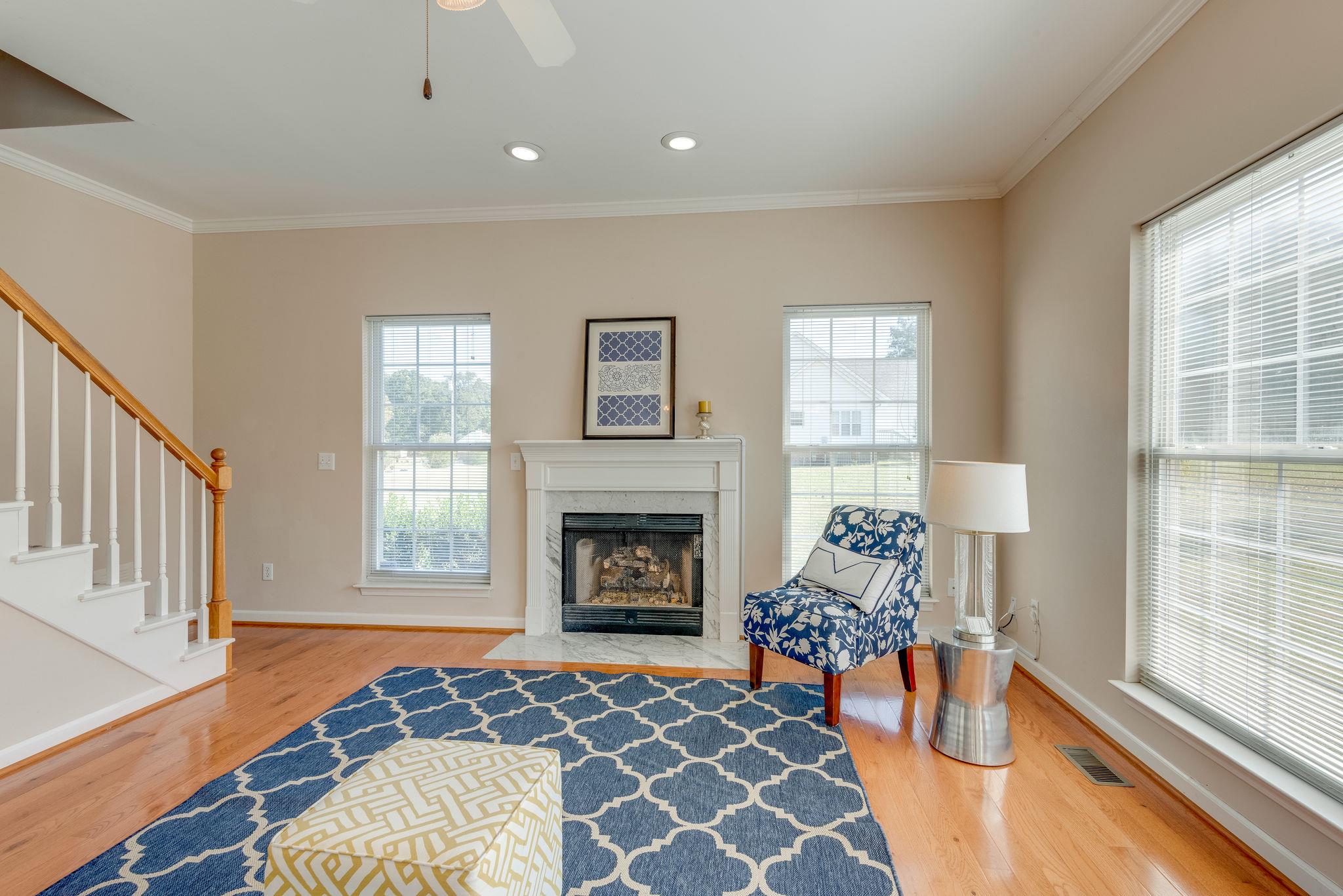 269 Eastside Road Burns, TN 37029 - Photo 9 of 22 a living room with furniture and a fireplace