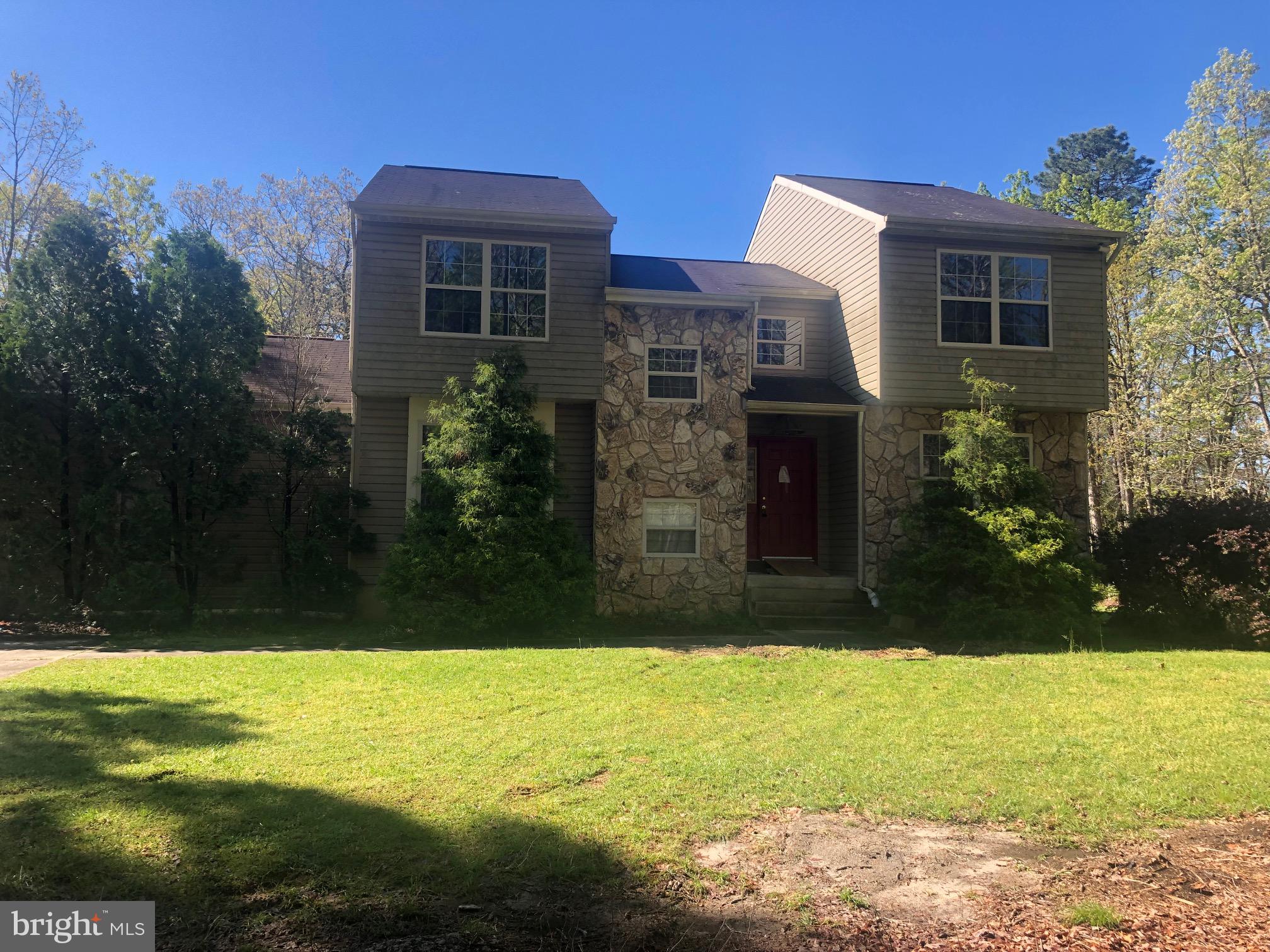 a view of a yard with an outdoor space