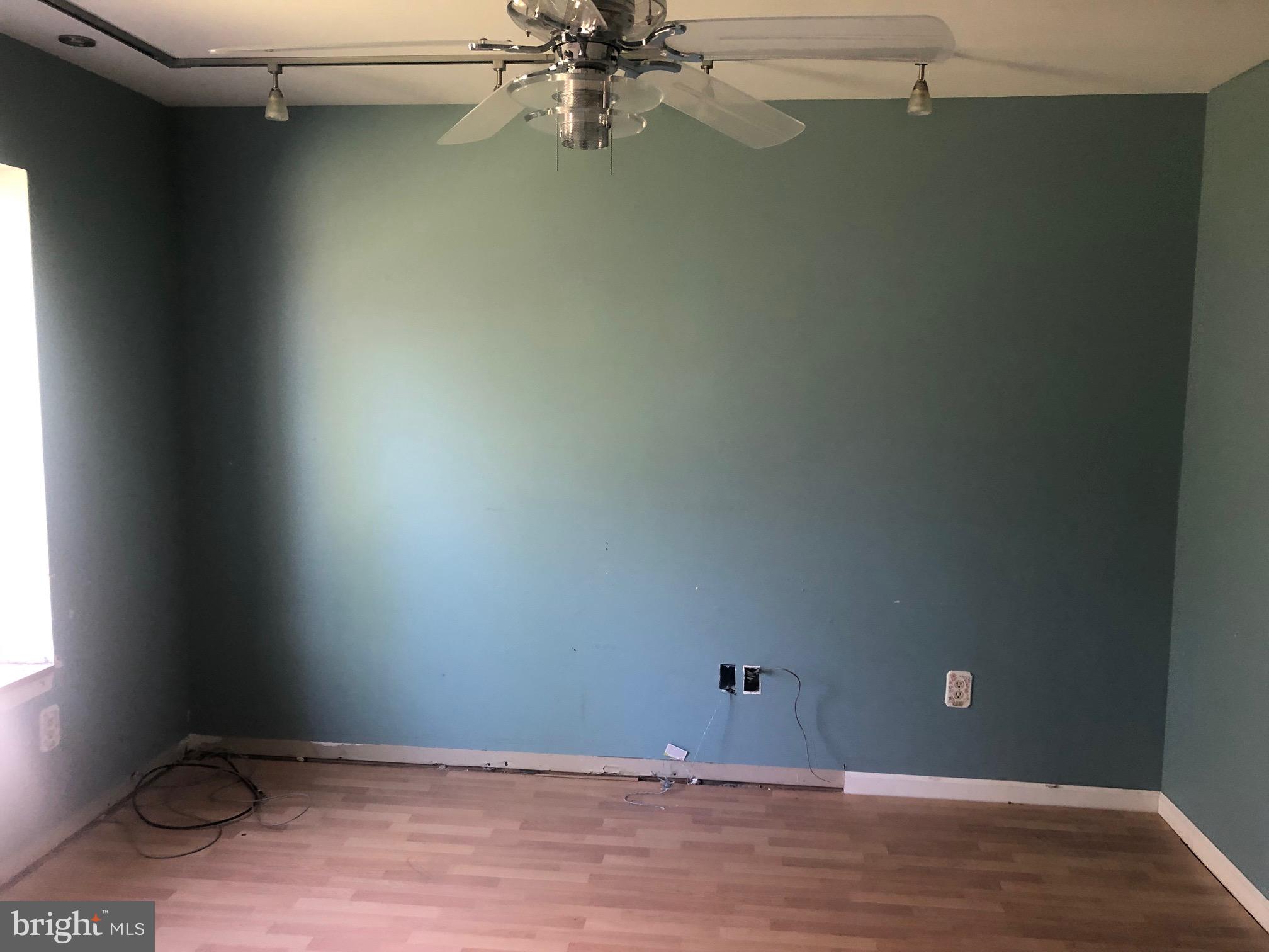 458 Weymouth Road Buena, NJ 08310 - Photo 6 of 12 a view of a room with an empty space and a window