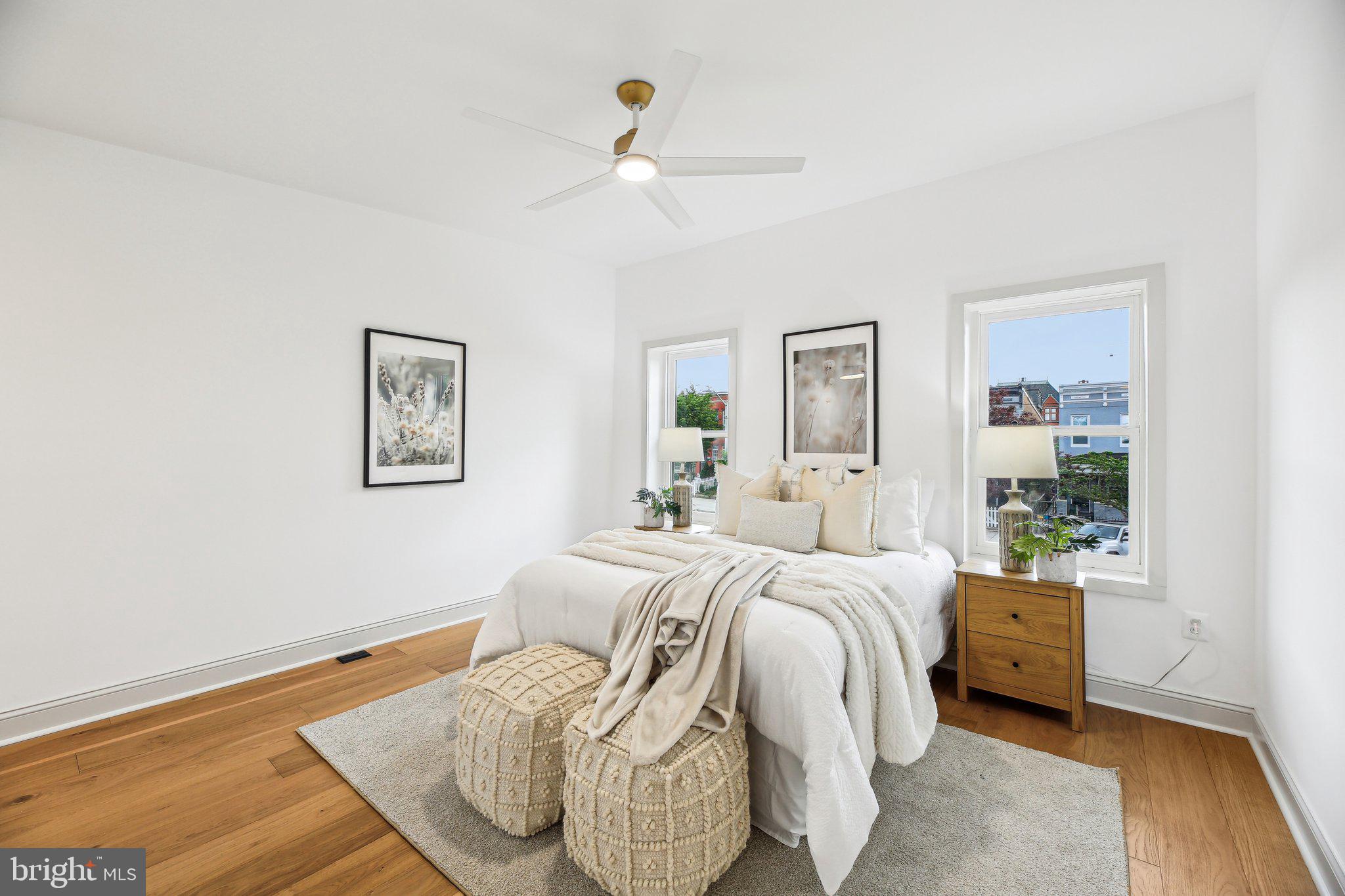 3348 Chestnut Avenue Baltimore, MD 21211 - Photo 19 of 39 a bedroom with a bed and a night stand