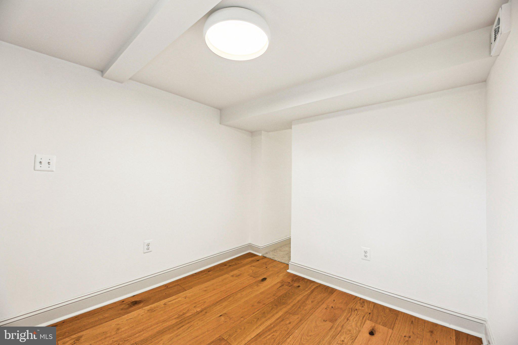 3348 Chestnut Avenue Baltimore, MD 21211 - Photo 27 of 39 a view of an empty room