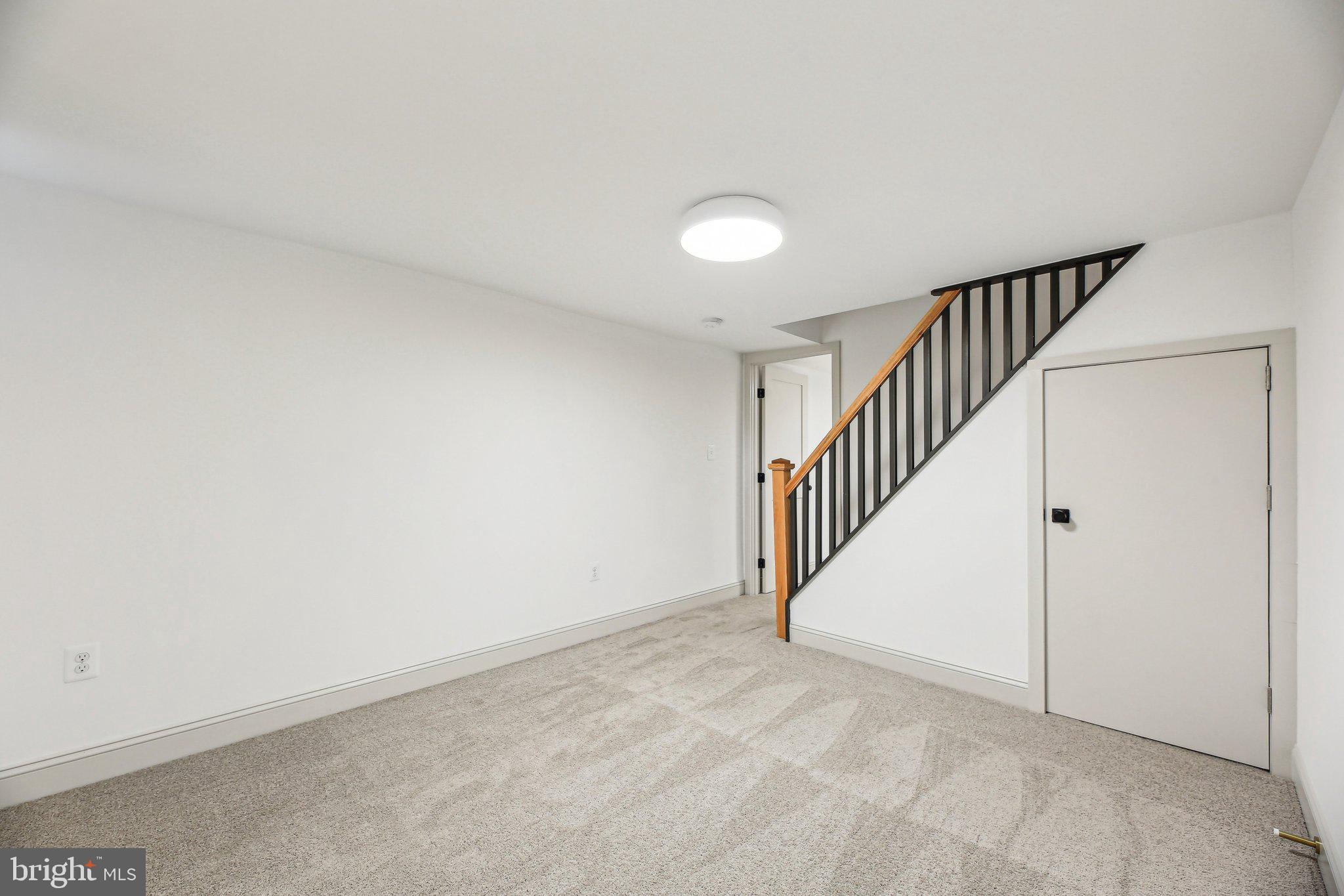 3348 Chestnut Avenue Baltimore, MD 21211 - Photo 29 of 39 a view of an entryway with stairs