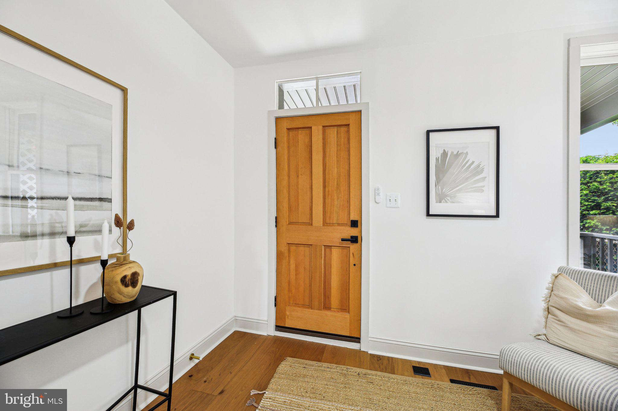 3348 Chestnut Avenue Baltimore, MD 21211 - Photo 5 of 39 a view of an entryway with wooden floor